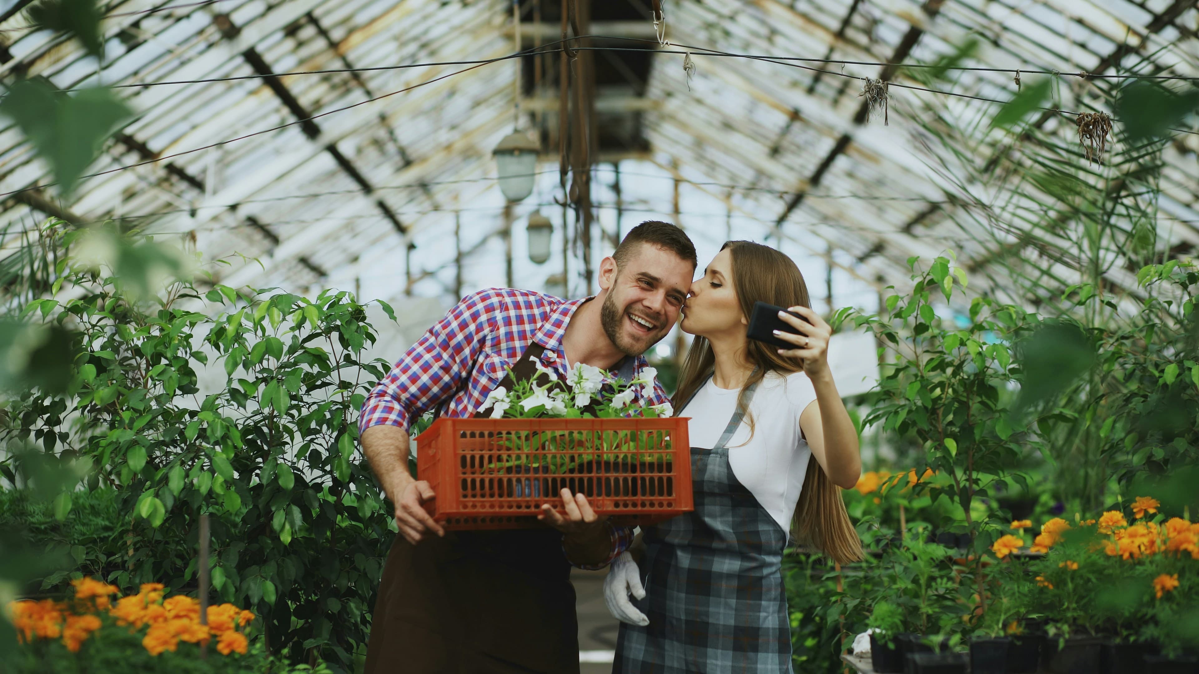 Happy couple gardening - experiencing authentic joy
